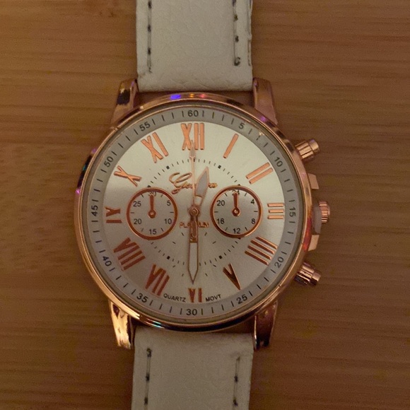 Genevo Platinum Quartz Movt watch with rose gold accented face and grey band - Picture 2 of 3